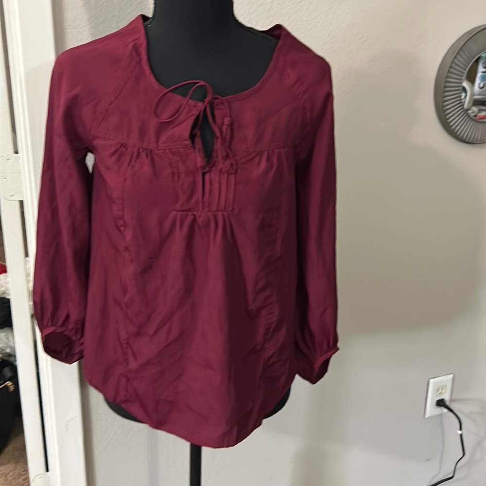 American eagle top‎